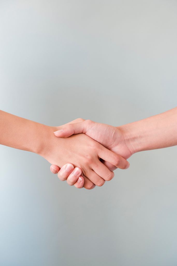 Photo of People Shaking Hands