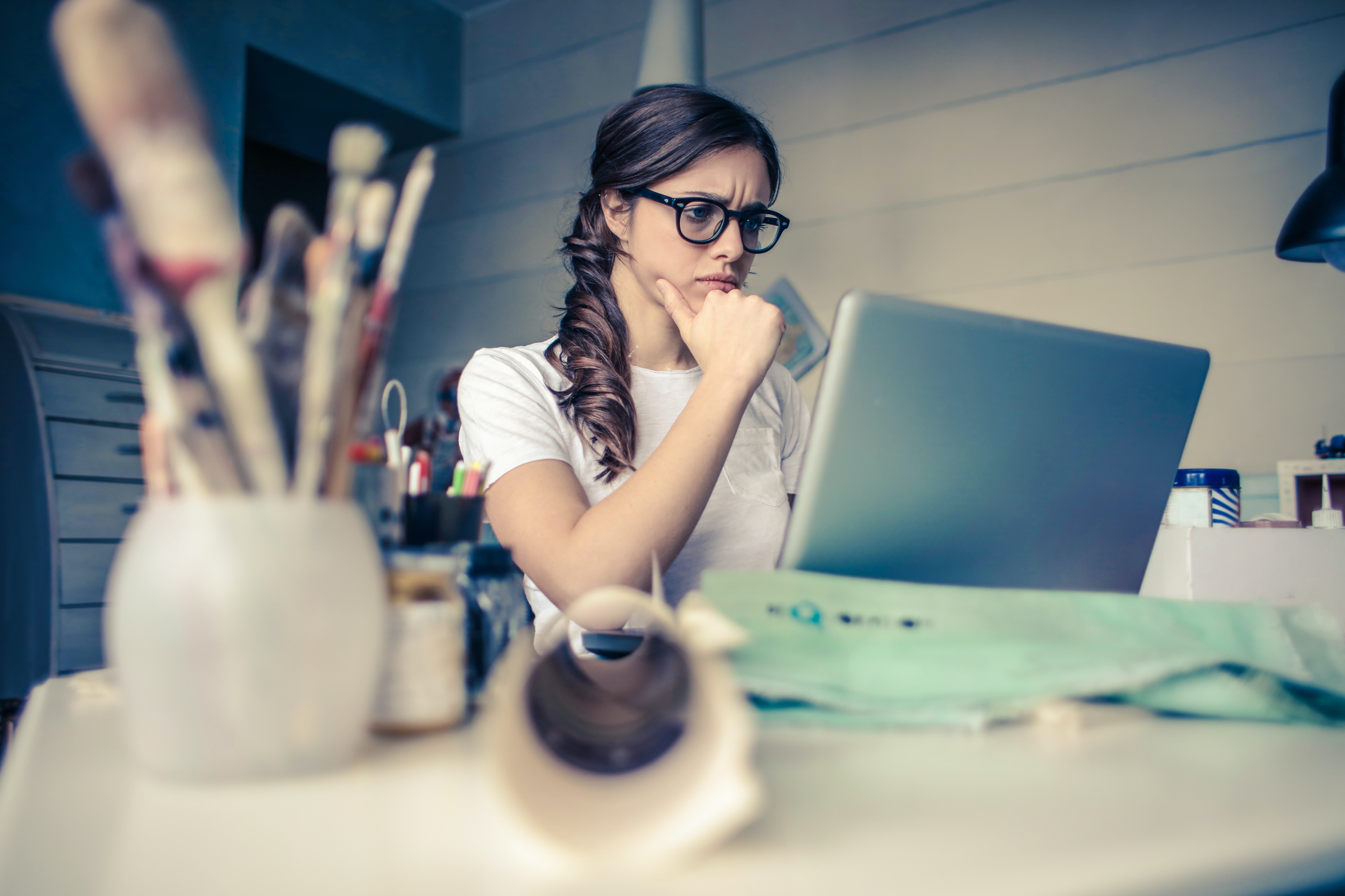 Woman stressing in front of laptop