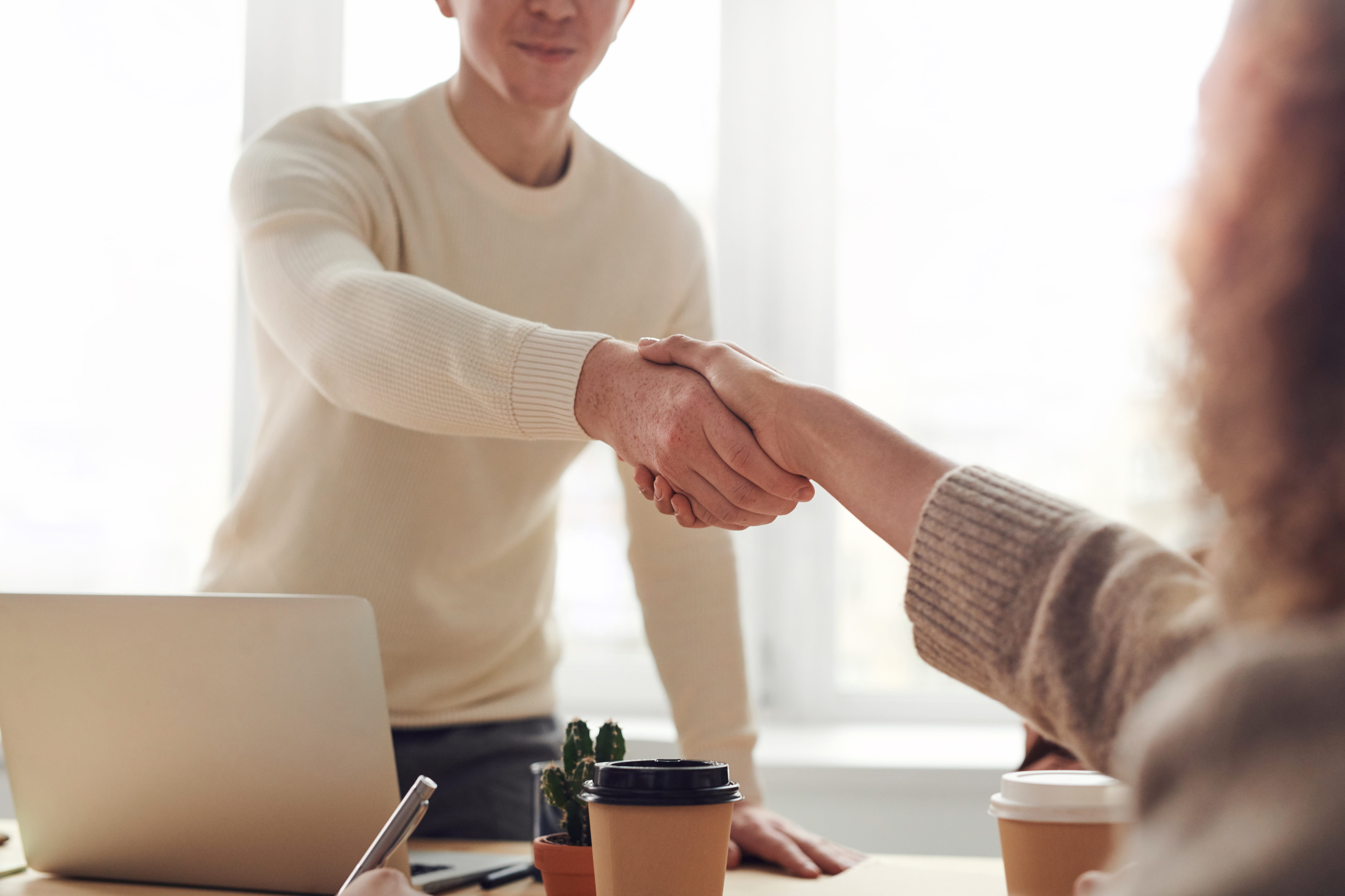 Two people shaking hands